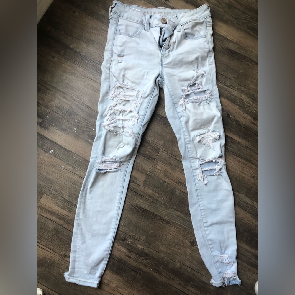 Light wash super ripped skinny jeans